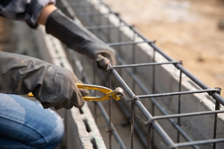 Steel reinforcement bar stacked on a construction site