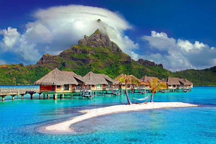 Overwater villas at a tropical island resort